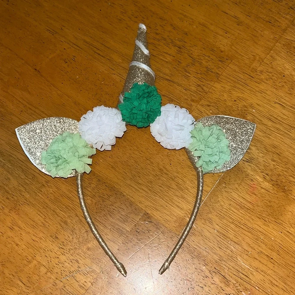 Gold Glitter Unicorn Headband With Green and White Pom Poms